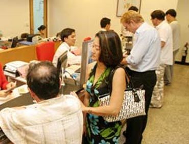 Cá nhân, tổ chức chỉ được góp vốn thành lập 1 ngân hàng
