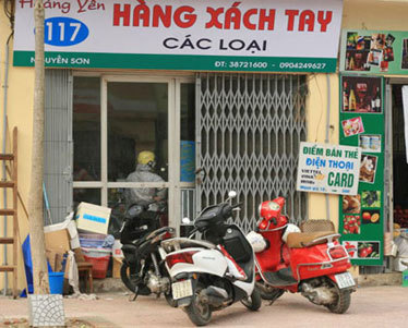 Hé lộ chiêu hàng xách tay hạ cánh về VN