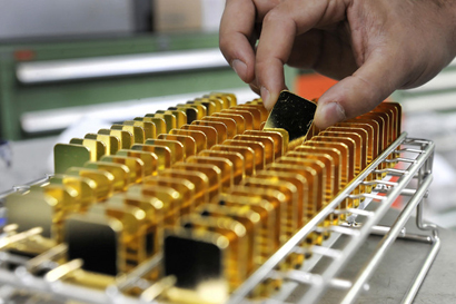 Vàng thế giới giảm mạnh nhất trong 3 tháng