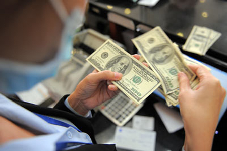Đã ép xuống, USD cuối năm vẫn bật lên?