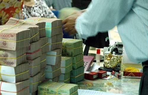 Lãi suất giảm: Ngân hàng kiếm lợi nhuận ở đâu?