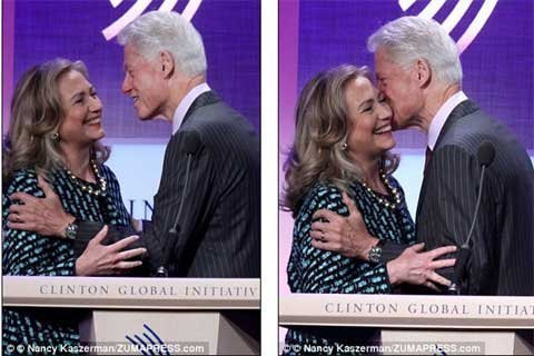 Vợ chồng Clinton ngượng ngùng ôm nhau