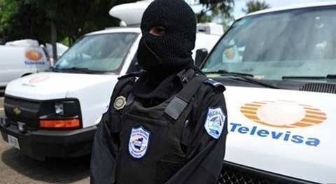 Án tù 30 năm cho 18 kẻ giả danh phóng viên