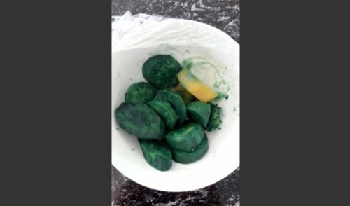 Singapore bác tin khoai lang VN chuyển màu xanh do dioxin
