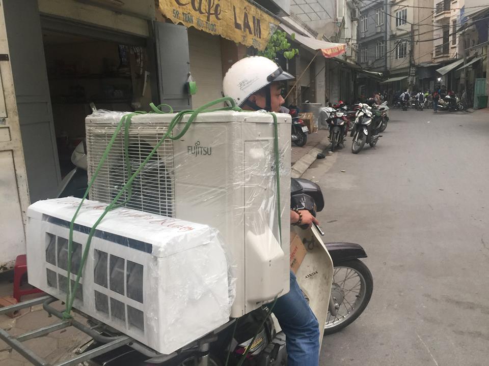 Hà Nội vào hè: Thợ tân trang máy lạnh kiếm 20 triệu đồng/tháng
