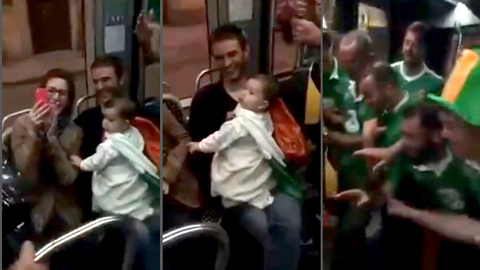 Fan cuồng bóng đá hát ru cho em bé trên tàu