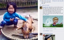 Bức ảnh bé gái òa khóc bên chú chó bị thui vàng lay động hàng triệu cư dân mạng