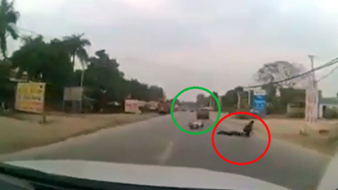 Ô tô ép ngã người đi đường rồi bỏ chạy