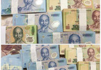 Đổi tiền mới Tết Đinh Dậu: Ngân hàng than khó, "chợ đen" chặt chém
