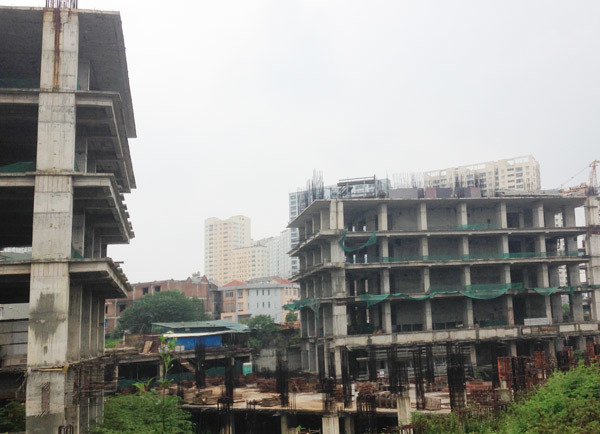 Dân mua cạn tiền, nhà đất giảm giá