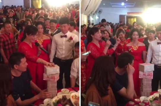 Cô dâu chú rể được mừng hàng cọc tiền giữa hôn trường