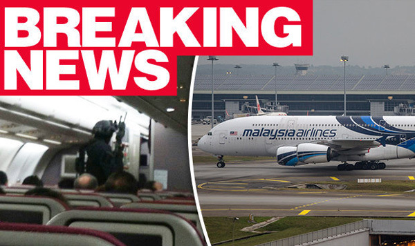 Máy bay Malaysia Airlines đảo chiều gấp vì kẻ tình nghi cố vào buồng lái