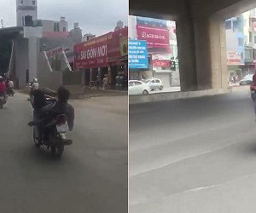 Thanh niên nằm ngửa, lái xe máy bằng chân như làm xiếc trên phố