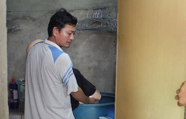 Nhấn vợ vào phuy nước đến chết rồi đưa xác về quê phi tang