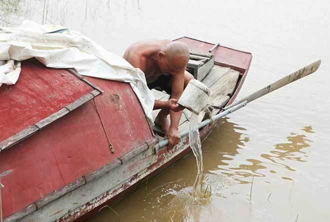 Kí ức đau lòng của người vớt 600 xác chết trên sông Hồng