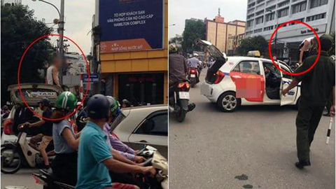 Bị CSGT dừng xe, tài xế taxi lên nóc xe 'ăn vạ'
