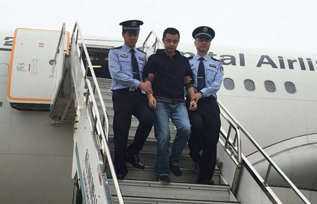 Quan tham TQ về nước đầu thú sau 5 năm trốn nã