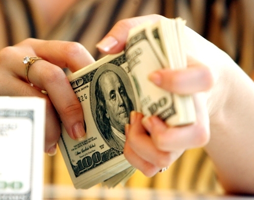 Không thể cấm dân nhận kiều hối bằng USD