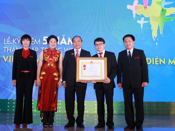 Báo Vietnam+ đón nhận Huân chương Lao động hạng Ba