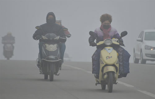 Hàng chục thành phố Trung Quốc mịt mù sương bụi