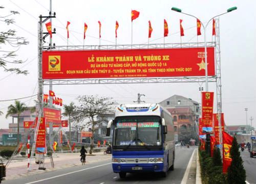 Cắt băng khánh thành dự án nâng cấp, mở rộng QL1A