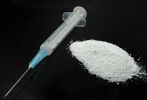 Việt kiều tử vong vì giấu heroin ở 