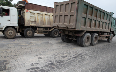 Quyết liệt vào cuộc xử lí vệt hằn bánh xe trên các quốc lộ