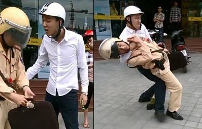 Vi phạm giao thông, vật CSGT ngã xuống đường