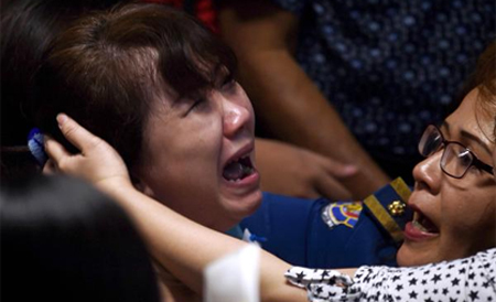 Ngất lịm khi nhìn thấy thi thể nạn nhân QZ 8501