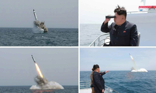 Kim Jong-un tươi cười xem phóng tên lửa đạn đạo